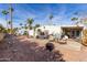 Backyard with patio, fire pit, and desert landscaping at 3104 E Broadway Rd # 22, Mesa, AZ 85204