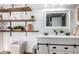 Bathroom with double vanity, floating shelves and a modern design at 3104 E Broadway Rd # 22, Mesa, AZ 85204