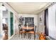 Small dining area with round table, chairs, and hutch at 3104 E Broadway Rd # 22, Mesa, AZ 85204