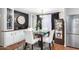 Charming dining area with a table for four and built-in cabinetry at 3104 E Broadway Rd # 22, Mesa, AZ 85204