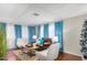 Spacious living room featuring hardwood floors and a comfortable leather couch at 3104 E Broadway Rd # 22, Mesa, AZ 85204