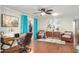Home office with a desk, comfortable chairs, and hardwood floors at 3104 E Broadway Rd # 22, Mesa, AZ 85204