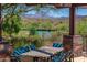 Outdoor patio table with seating and scenic views at 41120 N Congressional Dr, Anthem, AZ 85086