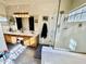 Bathroom with dual sinks, a shower and a tub at 4444 E Wildwood Dr, Phoenix, AZ 85048