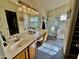 Large bathroom with dual sinks, soaking tub and walk-in shower at 4444 E Wildwood Dr, Phoenix, AZ 85048