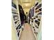 Walk-in closet offering extensive shelving and hanging space at 4444 E Wildwood Dr, Phoenix, AZ 85048
