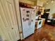 Kitchen boasts a refrigerator and wood flooring at 4444 E Wildwood Dr, Phoenix, AZ 85048