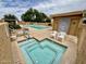 Community pool and spa with lounge chairs and restrooms at 4444 E Wildwood Dr, Phoenix, AZ 85048