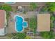 Aerial view of a backyard oasis with a pool, spa, and patio at 841 E Runaway Bay Pl, Chandler, AZ 85249