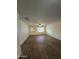 Bright and spacious living room featuring wood-look floors at 1033 S Florence Dr, Mesa, AZ 85208