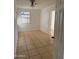 Spacious living room with tile flooring and access to other rooms at 1106 S 4Th St, Avondale, AZ 85323