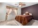 Cozy bedroom with ceiling fan and a double bed at 1310 E Lynx Way, Chandler, AZ 85249