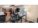 Home gym with an elliptical and access to the backyard at 1310 E Lynx Way, Chandler, AZ 85249