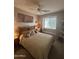 Bedroom with a bed, window, and ceiling fan at 14028 N Edgeworth N Dr # A, Fountain Hills, AZ 85268