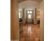 Bright entryway with terracotta tile floors and view to living room at 14028 N Edgeworth N Dr # A, Fountain Hills, AZ 85268