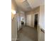 Hallway with doors to bedrooms and carpet flooring at 14028 N Edgeworth N Dr # A, Fountain Hills, AZ 85268