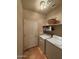 Photo of a laundry room with washer, dryer, and storage shelves at 14028 N Edgeworth N Dr # A, Fountain Hills, AZ 85268
