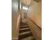 Indoor photo of a carpeted staircase with a wooden handrail at 14028 N Edgeworth N Dr # A, Fountain Hills, AZ 85268