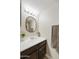 Clean bathroom with dark vanity, updated sink and fixtures at 4901 E Kelton Ln # 1006, Scottsdale, AZ 85254