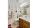 Bathroom with pink decor and double sink vanity at 4901 E Kelton Ln # 1006, Scottsdale, AZ 85254
