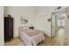 Bedroom with twin bed, closet, and wood flooring at 4901 E Kelton Ln # 1006, Scottsdale, AZ 85254