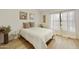 Bright bedroom with a double bed and large window at 4901 E Kelton Ln # 1006, Scottsdale, AZ 85254