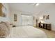Bright bedroom with high ceiling, large window, and ceiling fan at 4901 E Kelton Ln # 1006, Scottsdale, AZ 85254
