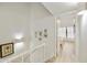 Bright hallway with light walls and framed artwork at 4901 E Kelton Ln # 1006, Scottsdale, AZ 85254