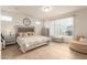 Spacious bedroom with plush bed and light color scheme at 6523 N 135Th Dr, Glendale, AZ 85307