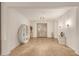 Bright and spacious entryway with tile flooring and modern decor at 6523 N 135Th Dr, Glendale, AZ 85307