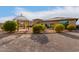 House exterior showcasing a large backyard with a gazebo and solar panels at 6523 N 135Th Dr, Glendale, AZ 85307