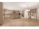 Modern kitchen featuring an island and ample cabinet space at 6523 N 135Th Dr, Glendale, AZ 85307