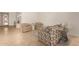 Spacious living room with seating area and access to the entry at 6523 N 135Th Dr, Glendale, AZ 85307