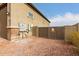 Side yard with gate and gravel at 6523 N 135Th Dr, Glendale, AZ 85307