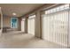 Bright sunroom features multiple windows and a comfy chair at 6523 N 135Th Dr, Glendale, AZ 85307