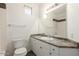 Clean bathroom with a vanity, toilet, and bathtub at 6900 E Princess Dr # 2183, Phoenix, AZ 85054