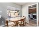 Small dining area with an oval table and chairs near the kitchen at 714 W Fogal Way, Tempe, AZ 85282