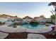 Inviting pool with waterfall feature and surrounding patio at 8601 W Chickasaw St, Tolleson, AZ 85353