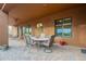 Outdoor dining area with seating and a ceiling fan at 10751 E Cactus View Cir, Gold Canyon, AZ 85118