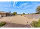 Spacious backyard with gravel and desert landscaping at 11815 N Rio Vista Dr, Sun City, AZ 85351