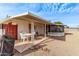 Covered patio with table and chairs, great for outdoor dining at 11815 N Rio Vista Dr, Sun City, AZ 85351