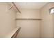 Large closet with double hanging rods and shelves at 23920 N 75Th St, Scottsdale, AZ 85255