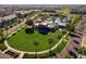 Aerial view of community pool and green space at 2949 N Acacia Way, Buckeye, AZ 85396