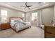 Main bedroom with king bed and ample closet space at 2949 N Acacia Way, Buckeye, AZ 85396