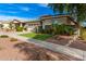 Single-story home with landscaped yard and attached garage at 2949 N Acacia Way, Buckeye, AZ 85396