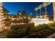 Verrado Golf Club entrance at night, illuminated signage and landscaping at 2949 N Acacia Way, Buckeye, AZ 85396