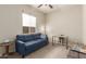 Comfortable office space with a sofa and work desk at 2949 N Acacia Way, Buckeye, AZ 85396
