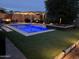 Stunning pool and spa with surrounding landscaping at 2949 N Acacia Way, Buckeye, AZ 85396