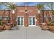 Heritage Swim Park entrance, brick building with large double doors at 2949 N Acacia Way, Buckeye, AZ 85396