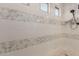 Spa-like shower with elegant tile work at 2949 N Acacia Way, Buckeye, AZ 85396